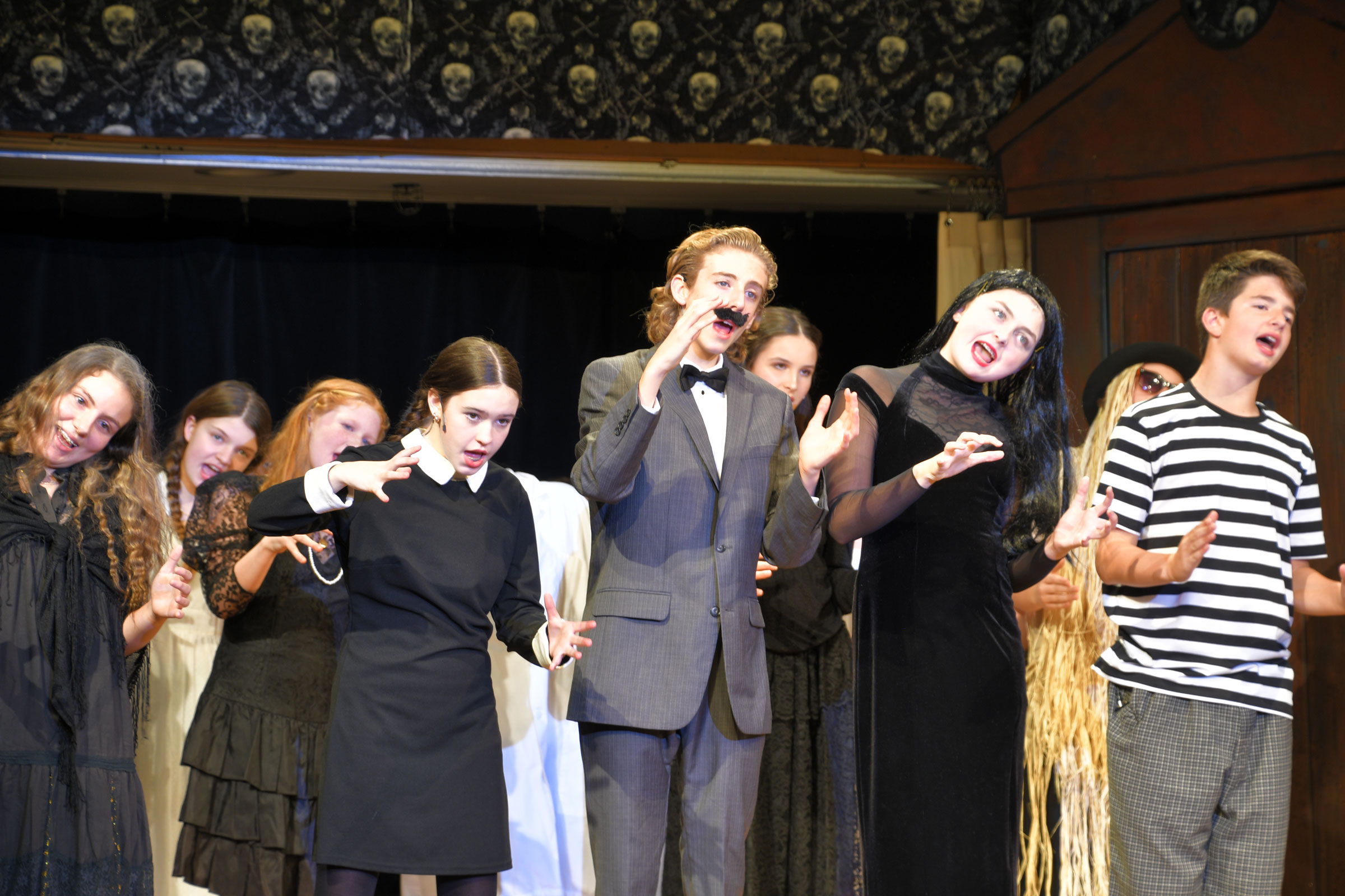 Middle School students perform The Addams Family.